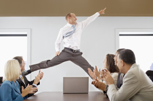 Businessman Midair in a Business Meeting